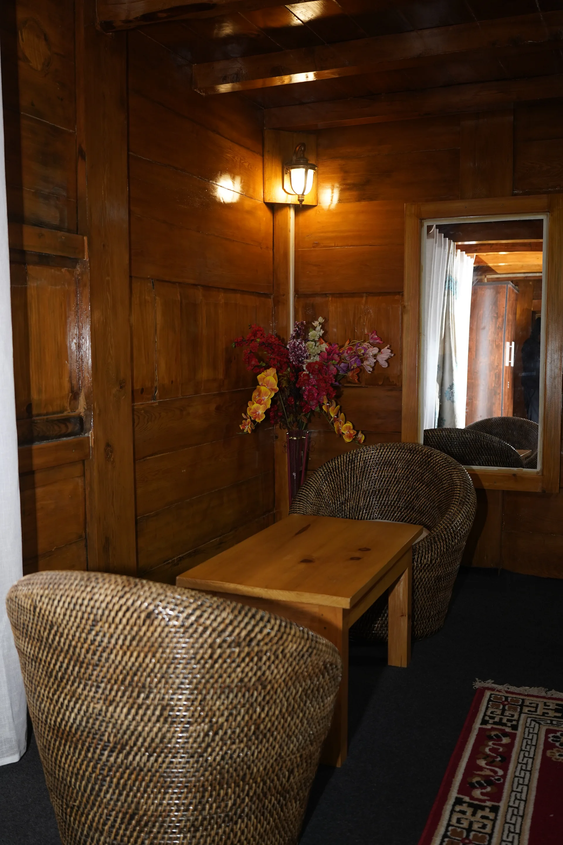 Wooden staircase interior overhead view at Acorn Homestay